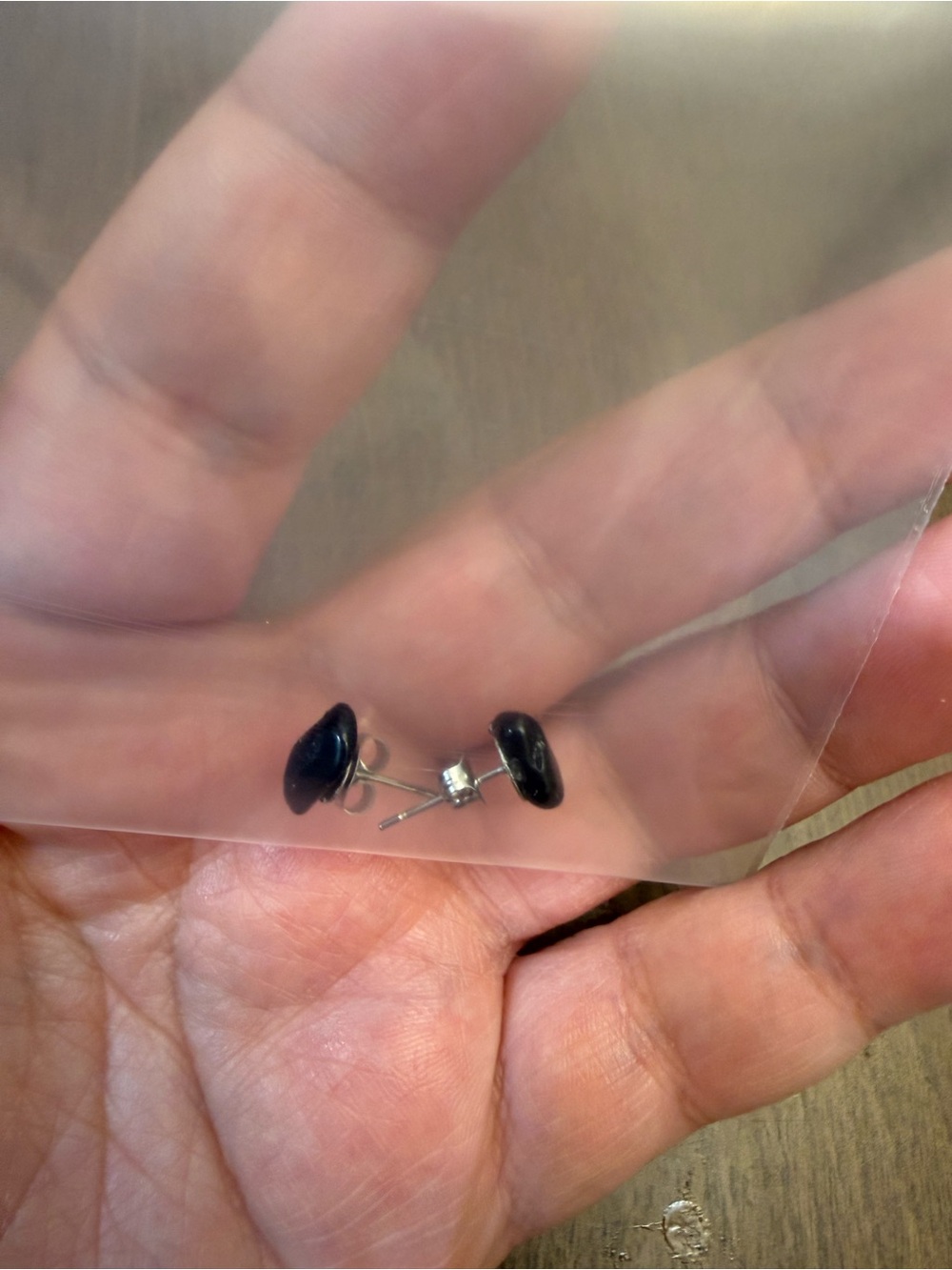 Silver stud earrings with black stone